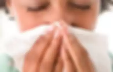 Virus corona dapat menyebar melalui batuk dan bersin