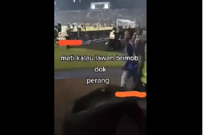 Video diduga dokter dan polisi yang tertawa lepas menyaksikan tragedi Kanjuruhan.