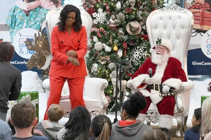Michelle Obama does the 'Orange Justice' Fortnite dance in front of the kids with Santa
