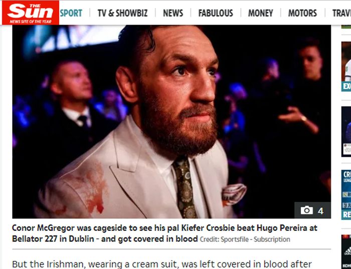 Tangkapan layar berita The Sun yang memperlihatkan baju Conor McGregor berlumuran darah