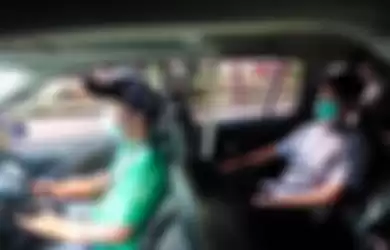 Armada khusus GrabCar yang dibuatkan pembatas antara pengemudi dengan penumpang.