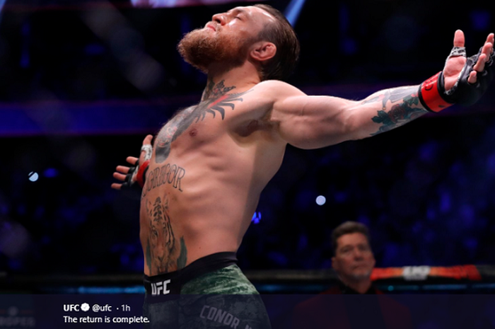 Selebrasi Conor McGregor usai menang dalam waktu 40 detik lawan Donald Cerrone pada UFC 246 di T-Mobile Arena, Las Vegas, Minggu (19/1/2020). 