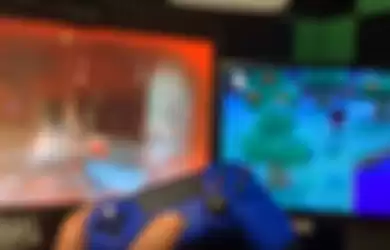 Cuplikan video Slimecicle yang memainkan dua game bersamaan dengan satu controller.