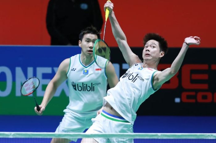 Pasangan ganda putra Indonesia, Marcus Fernaldi Gideon/Kevin Sanjaya Sukamuljo, pada perempat final All England Open 2020 di Arena Birmingham, Inggris, Jumat (13/3/2020).