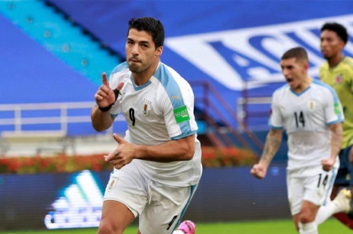 Penyerang timnas Uruguay, Luis Suarez, melakukan selebrasi usai mencetak gol ke gawang timnas Kolombia dalam laga Kualifikasi Piala Dunia 2022 zona Conmebol, Jumat (13/11/2020) atau Sabtu pukul 03.30 WIB. 